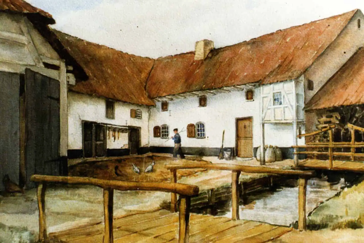 pki-geboortehuis-pater-karel-molen-geleenbeek-munstergeleen Aquarel van het geboortehuis van Pater Karel aan de Geleenbeek in Munstergeleen, met houten brug en witte vakwerkgebouwen